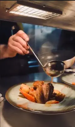 Chef preparing Turkish dishes at Hisar Kitchen
